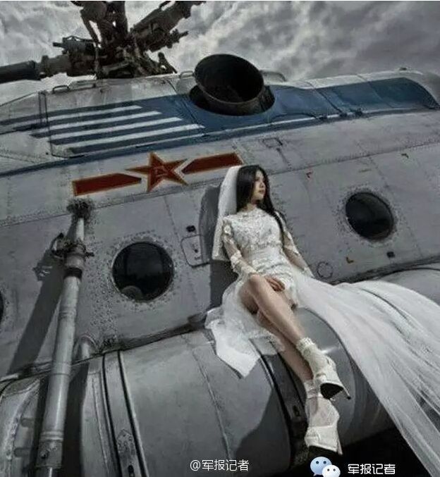 超炫軍人婚紗大片：戰(zhàn)機(jī)做背景 新娘美艷
